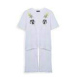T-shirt blanc à nœuds et étoiles